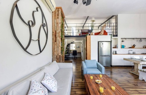 Old North Apartment | Modern Loft Retreat with Rooftop by Sea N Rent
