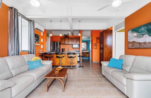 Coco Condo | Modern Top-Floor Condo with Panoramic Views and Community Pool