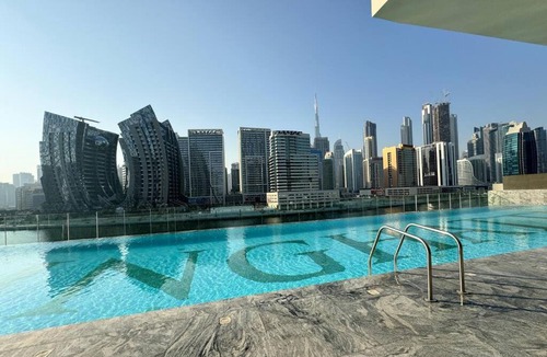 Business Bay Apartment | Opulent Lifestyle with Burj Khalifa and Canal View