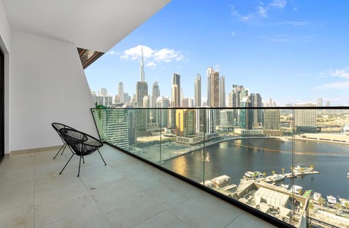 Business Bay Apartment | Opulent Lifestyle with Burj Khalifa and Canal View