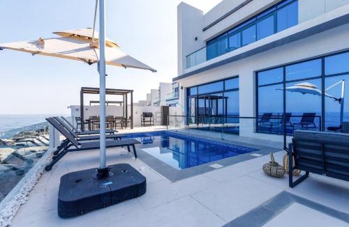 Sharm Apartment | Overlooking Pool, Mountain and Sea 6BR Villa with Two Assistant Room, Heated Pool, BBQ Area, Al Dana Island, Fujairah by Deluxe Holiday Homes