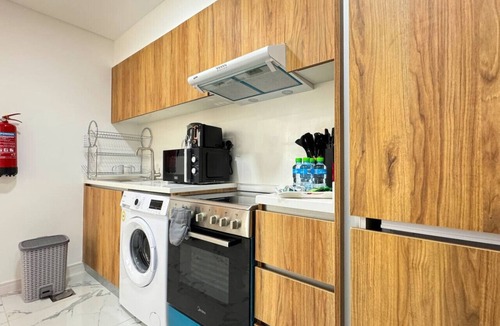Masdar City Apartment | Palm Grove: Elegant 2BR Oasis