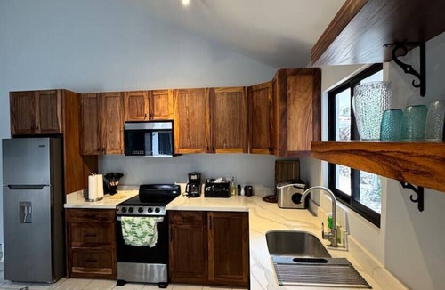Coco House | Peaceful 2BR, 1BA Casita/Shared Pool & Nature/2 Min Drive to Coco Beach & Town