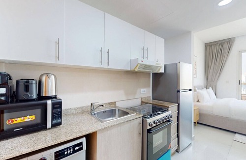 Dubai Production City Apartment | Peaceful Studio l City Skyline View l IMPZ