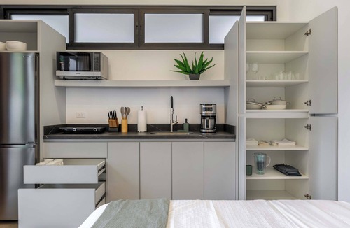 Pinilla Apartment | Pinilla Living Studios 3, Secluded bedroom, exclusive deck and pool