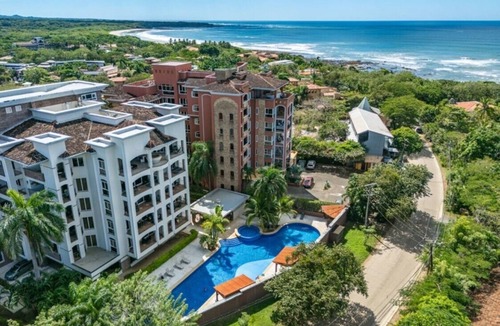 Playa Langosta Condo | Playa Langosta rental, lovely Condo Suitable for 2 couples or a family, with 3 pools, game room and 2 gyms, Peninsula 37,