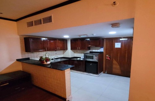 Sharjah House | Presidential Luxury Studio Suite with Jacuzzi