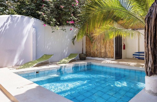 Playa Grande Cabin | Private room with pool, walking distance to beach