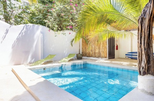 Playa Grande Apartment | Private room with pool, walking distance to beach