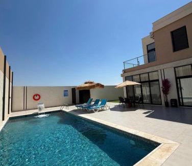 Al-Maghtas Ski Chalet | Royal Pearl Villa 1