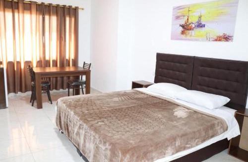 Al Jizah Apartment | Salvador Dali Apartments