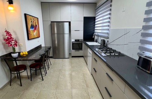 Tiberias Apartment | sea view penthouse with 3 floors and an hot tub! can host up to 15 people .