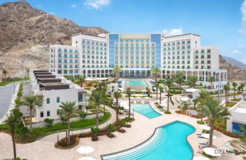 Sharm Apartment | Seafront 4BR Apartment with Assistant Room in The Address Fujairah Residences Block B, Fujairah by Deluxe Holiday Homes