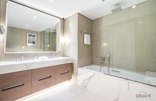 Sharm Apartment | Seafront 4BR Apartment with Assistant Room in The Address Fujairah Residences Block B, Fujairah by Deluxe Holiday Homes