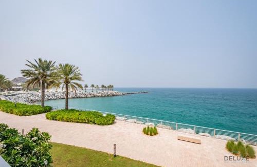 Sharm Apartment | Seafront 4BR Apartment with Assistant Room in The Address Fujairah Residences Block B, Fujairah by Deluxe Holiday Homes