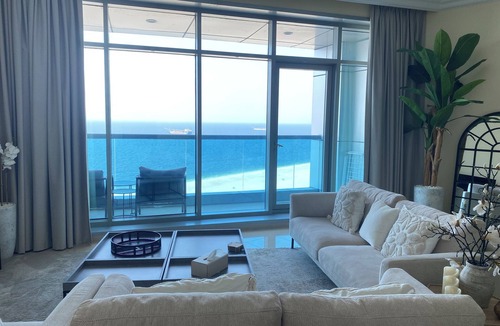 Rumailah Apartment | Seaside Gem – 2BR Beachfront Apartment