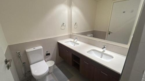 Dubai Apartment | Serene Golf Escape 2BR, Pool, Near Expo and Airport