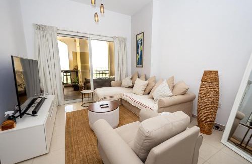 Al Hamra Village Apartment | Serene Lagoon Escape