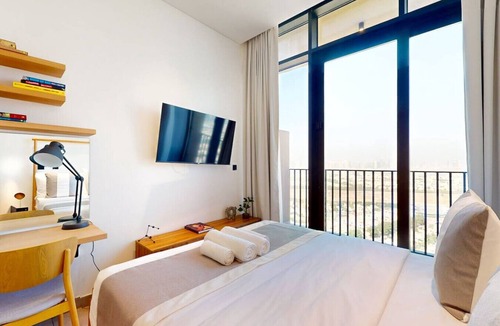 Jumeirah Village Triangle Apartment | Skyline Views: Sunset Studio with Balcony
