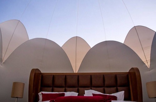 Wadi Musa Hotel | Sleep in Petra under the stars and enjoy your own hot tub.