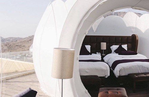 Wadi Musa Hotel | Sleep in Petra under the stars and enjoy your own hot tub.