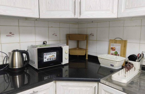 Al Zahiyah Apartment | Soothing 1 room in a sharing apartment with AC in fabulous Auh ROOM ONLY