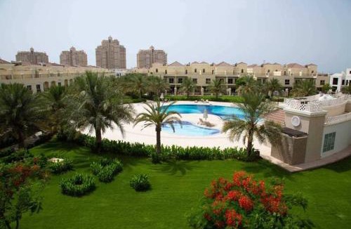 Al Hamra Village Villa | Spacious, Cozy Villa with Pool Access