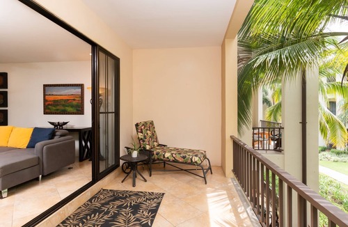 Coco Condo | Spacious One-Bedroom Condo with Pool View, Balcony & Beach Club Access