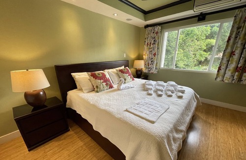 Ciudad Cariari Condo | Spectacular Golf course views. Gated. Quiet. 15 min to SJO Airport