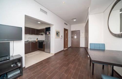 Dubai Sports City Apartment | StoneTree - Spacious Studio - The Matrix