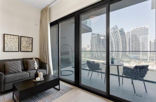 Business Bay Apartment | Studio Retreat with Canal and Burj Khalifa Views
