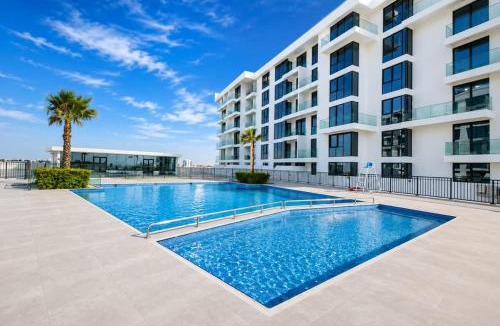 Al Hamriya Apartment | Stunning Beachfront Studio at Blue Bay Walk - Ajmal Makan