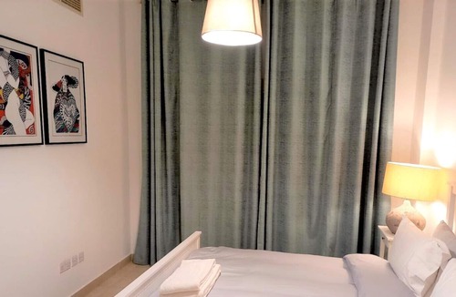 Al Hamra Village Apartment | Stunning Pool villa with Garden RAK