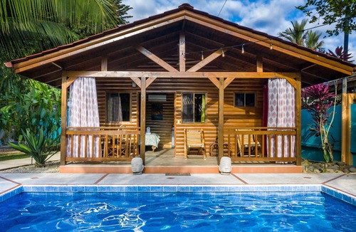 Barrio Las Parcelas Cabin | Style and Comfort: Tropical Studio Cabina A/C Pool