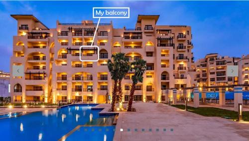 Village Road Apartment | Stylish Pool view studio in Al Dau Heights
