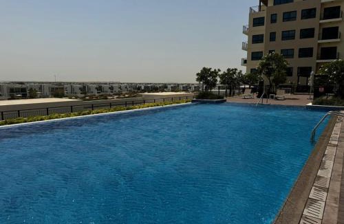 Dubai Apartment | Stylish Poolside Stay Brand New Interiors
