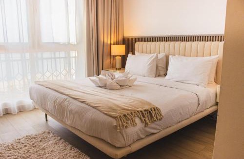 Al Hamra Village Apartment | Stylish Two-Bedroom Apartment Overlooking the Sea by Hala Homes