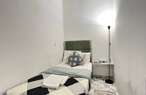 Al Wahdah Apartment | Tanih Place 6
