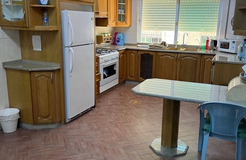 Suwailih Apartment | Tla Al-Ali, 2BR app, street-level, terrace - from German/Jordanian family.