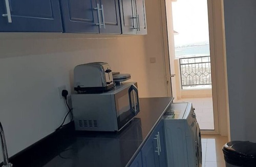 Al Hamra Village Apartment | Two Bed Room Apartment with Balcony and sea view