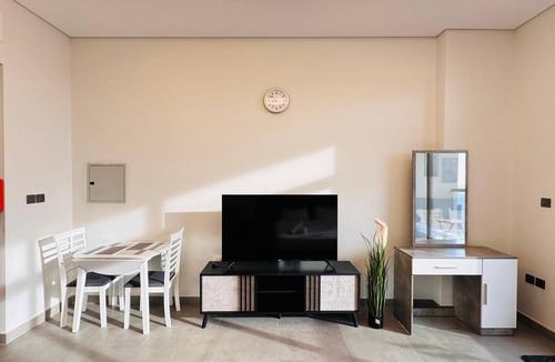 Business Bay Apartment | Upscale Apartment at Oval Tower Near Downtown with Balcony and Parking by Belvilla
