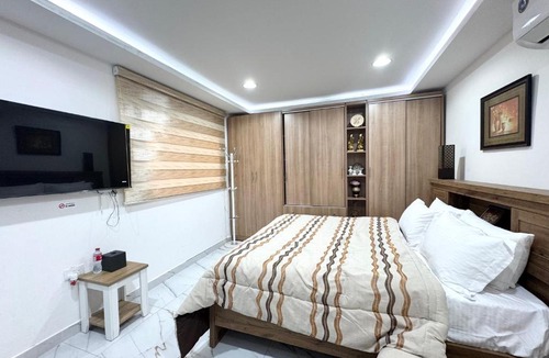 Abu Dhabi City Center Apartment | Velmora Villas Room 12