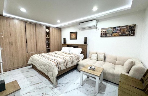 Abu Dhabi City Center Apartment | Velmora Villas Room 12