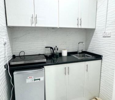 Abu Dhabi City Center Apartment | Velmora Villas room 14
