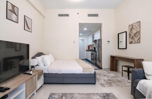 Dubai Apartment | Warm & Stylish Studio with Balcony