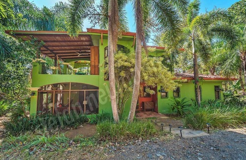 Junquillal House | Welcome to Casa Verde, where Costa Rica doesn't just surround you — it becomes part of your everyday. This one-of-a-kind home is tucked inside Tierra Pacífica, a beautiful residential community that gives you the privacy of a jungle retreat with the