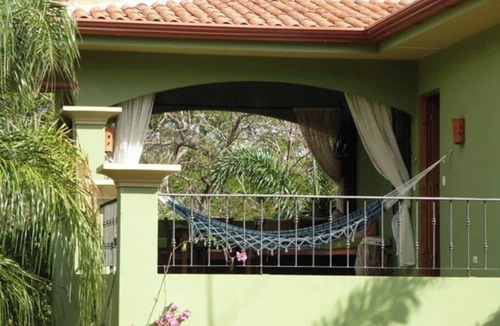 Junquillal House | Welcome to Casa Verde, where Costa Rica doesn't just surround you — it becomes part of your everyday. This one-of-a-kind home is tucked inside Tierra Pacífica, a beautiful residential community that gives you the privacy of a jungle retreat with the