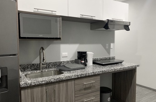 Tamarindo Apartment | Whitestone Parkview Tamarindo 2 queen bed studio w/kitchen 7 min walk to beach