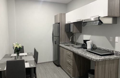 Tamarindo Apartment | Whitestone Parkview Tamarindo 2 queen bed studio w/kitchen 7 min walk to beach