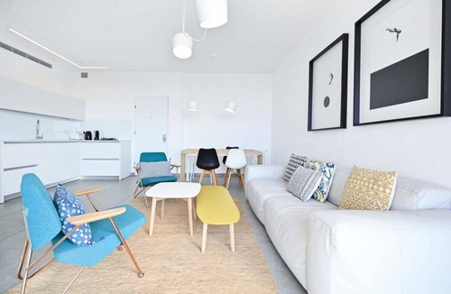 Jaffa Apartment | Yellow blue by HolyGuest